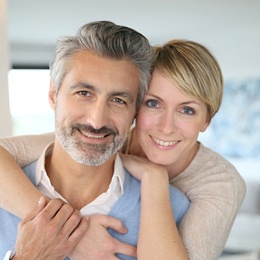Middle age man and woman smiling