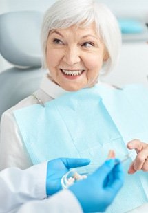 a patient receiving new dentures near Eglinton East