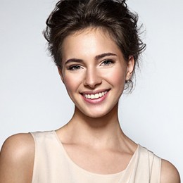 A woman smiling