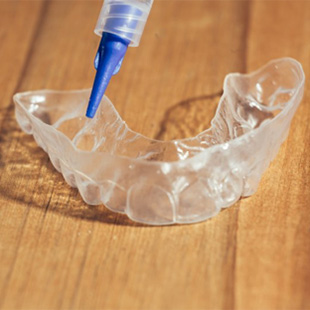 A whitening tray and piping device.