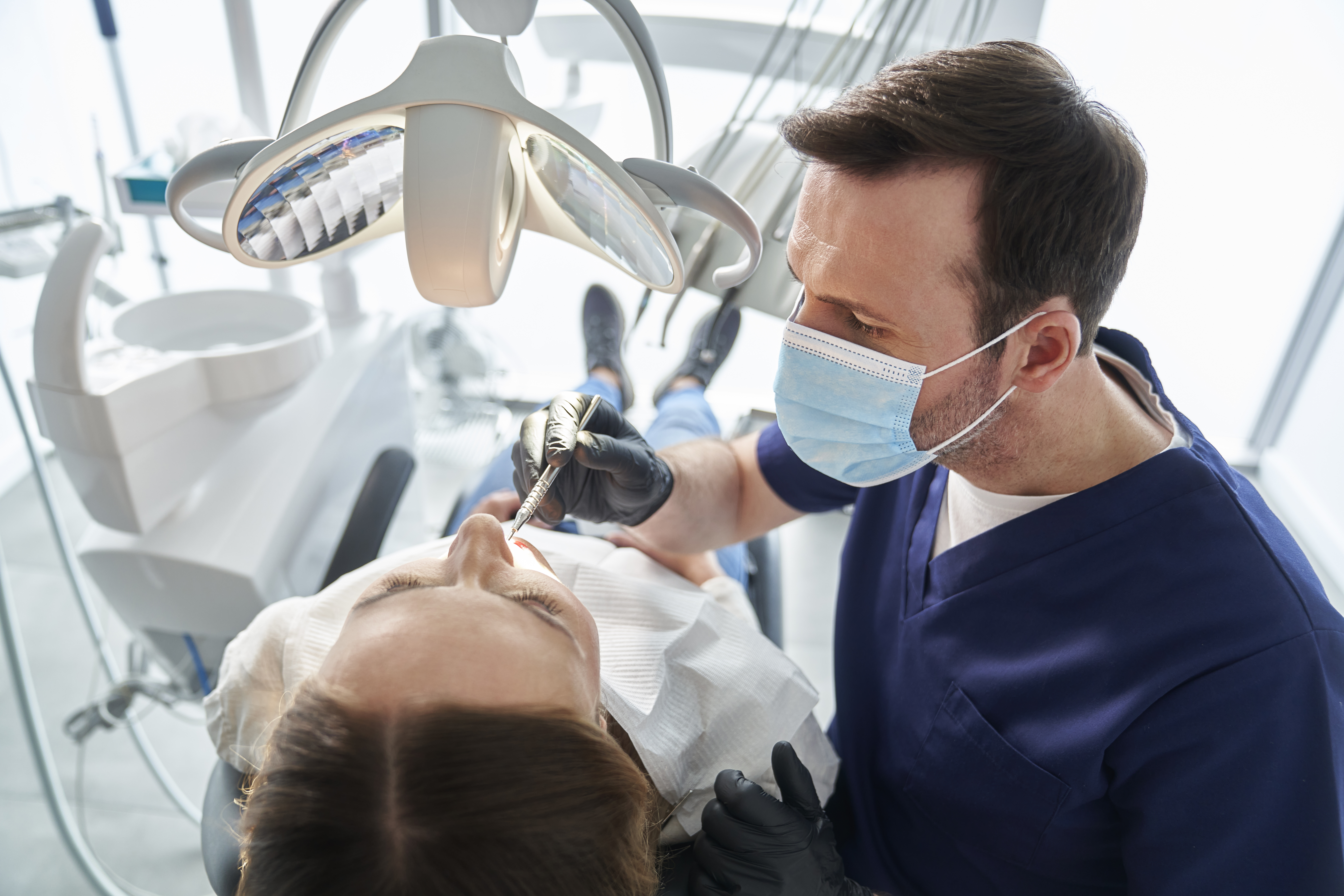 Dentist with smiling patient at Bal Dental Centre